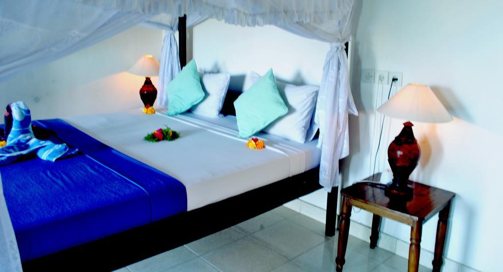 Titi Sedana Homestay อาเม็ด ภายนอก รูปภาพ