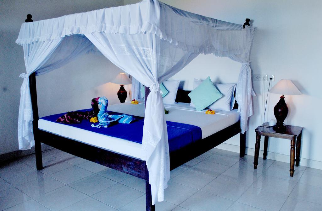 Titi Sedana Homestay อาเม็ด ภายนอก รูปภาพ