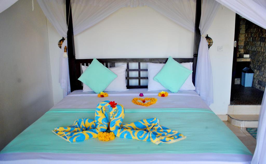 Titi Sedana Homestay อาเม็ด ภายนอก รูปภาพ